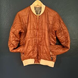 Cotopaxi Kusa bomber jacket reversible